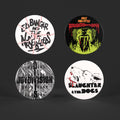 Four round badges with punk graphic designs and text on a dark background featuring bands Ed Banger, Slaughter & the Dogs and Joy Division