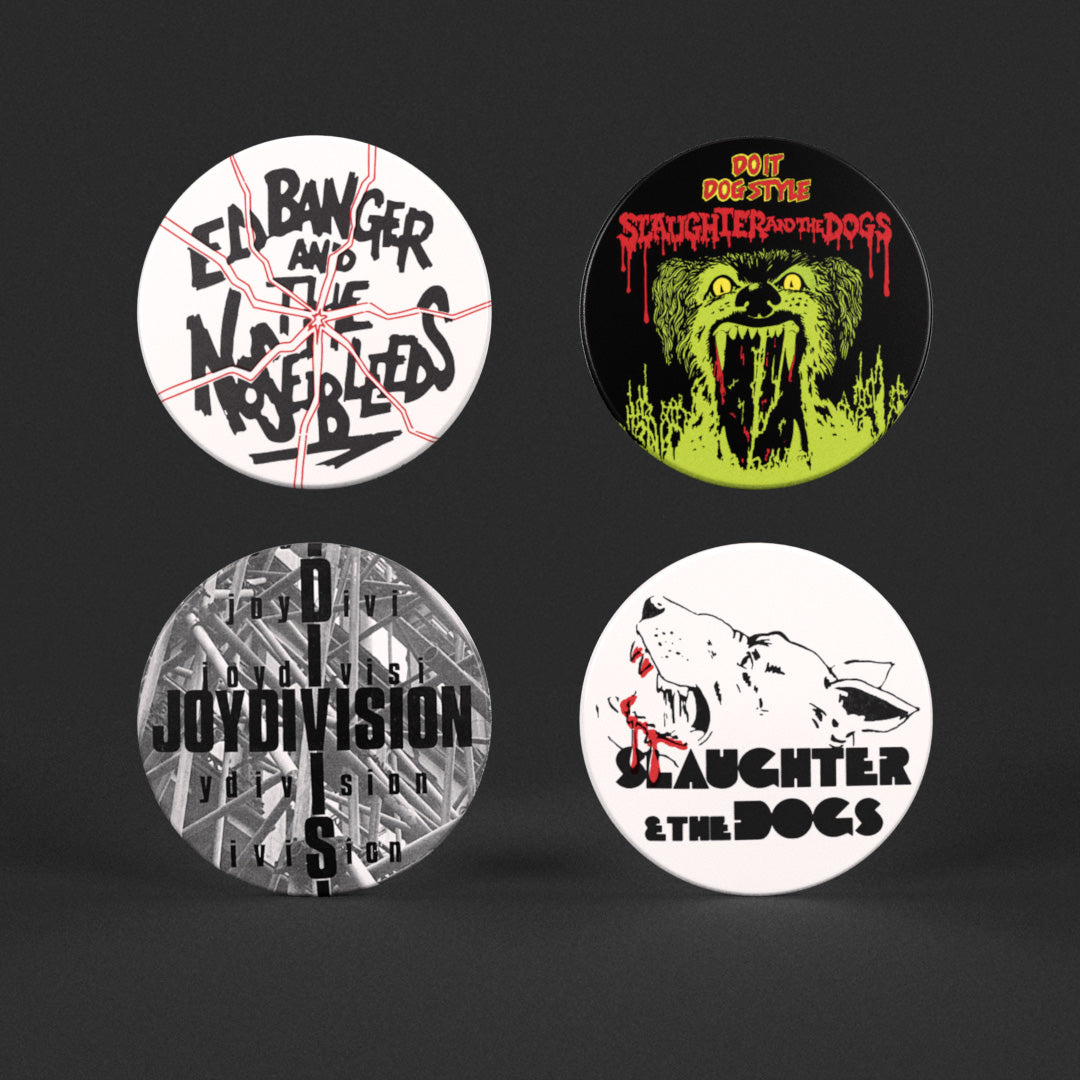 Four round badges with punk graphic designs and text on a dark background featuring bands Ed Banger, Slaughter & the Dogs and Joy Division